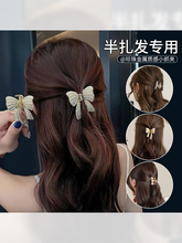 Заколки/резинки для собак фото