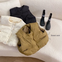 Жилеты фото