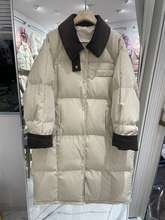 Пуховики фото