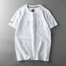 Футболки, пуловеры фото