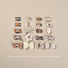 Заколки/резинки для собак фото